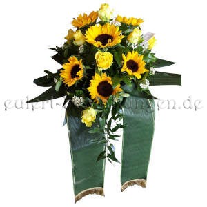 Gesteck zur Beerdigung aus Sonnenblumen mit Schleifenbändern