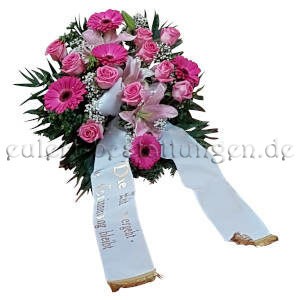 Wunderschöne Blumen zur Beerdigung in Pink aus Rosen, Gerbera, Lilien und Blattgrün. Als Gesteck mit Wasserspeicher.