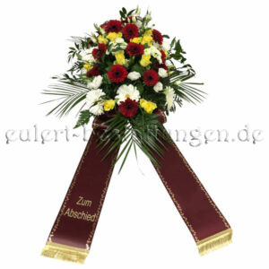 Buntes Blumengesteck Rot-Gelb-Weiß zur Bestattung mit Trauerschleifen