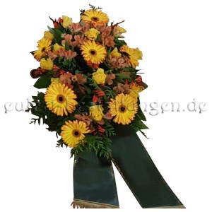 Herbstlich-buntes Trauergesteck aus Gerbera und Alstromerien mit Schleifen